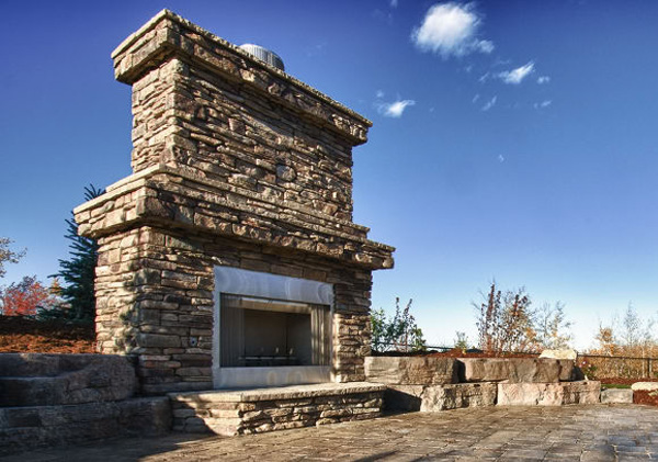 Cougar Ridge landscape design features include patio and outdoor fireplace.